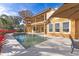 Stunning pool and spa area adjacent to a beautiful lakefront home at 10018 Lone Tree Ln, Orlando, FL 32836