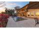 Luxury home with inviting pool, patio, and fountain at 10018 Lone Tree Ln, Orlando, FL 32836