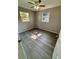 Spacious bedroom featuring light gray walls and wood-look floors at 1018 4Th St, Port Orange, FL 32129
