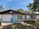 Newly renovated single story home with a landscaped lawn at 1018 4Th St, Port Orange, FL 32129