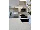 Modern kitchen with stainless steel appliances and white cabinets at 1018 4Th St, Port Orange, FL 32129