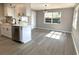 Open concept kitchen with island and modern appliances at 1018 4Th St, Port Orange, FL 32129