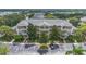 A stunning building exterior with private patios, lush landscaping and adjacent parking at 103 Rum Run # 103, Davenport, FL 33837