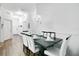 Lovely dining room features modern chandelier and views into the entryway at 103 Rum Run # 103, Davenport, FL 33837