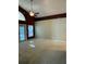 High ceilings and neutral walls in this living room at 10418 Reagans Run Dr, Clermont, FL 34711