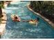 Relaxing lazy river with clear blue water, perfect for leisurely floats on sunny days at 10601 Autumn Mist Ln # 302, Golden Oak, FL 32836