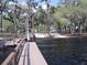 Waterfront community featuring a boat launch and dock with easy access to the water for recreational activities at 11618 Grand Bay Blvd, Clermont, FL 34711