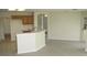 Kitchen area with a breakfast bar and wood cabinets with wood floors at 11618 Grand Bay Blvd, Clermont, FL 34711