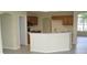 Kitchen area with a breakfast bar and wood cabinets at 11618 Grand Bay Blvd, Clermont, FL 34711