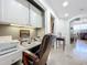Home office features built-in cabinets and a desk at 13407 Fountainbleau Dr # 5-2, Clermont, FL 34711