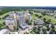 Luxury high-rise building with resort amenities and golf course views at 1358 Centre Court Ridge Dr # 202, Reunion, FL 34747