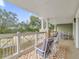 Balcony with patio furniture and golf course view at 1358 Centre Court Ridge Dr # 202, Reunion, FL 34747