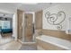 Spa-like bathroom with a soaking tub, shower, and updated fixtures at 1358 Centre Court Ridge Dr # 202, Reunion, FL 34747