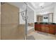 Bathroom with double vanity, soaking tub and walk-in shower at 1358 Centre Court Ridge Dr # 202, Reunion, FL 34747