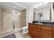 Bathroom with single vanity and walk-in shower at 1358 Centre Court Ridge Dr # 202, Reunion, FL 34747