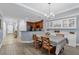 Dining room with wood floors and modern light fixture at 1358 Centre Court Ridge Dr # 202, Reunion, FL 34747