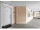 Building hallway with neutral colored walls and white doors at 1358 Centre Court Ridge Dr # 202, Reunion, FL 34747