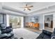 Living room with access to balcony and reclining sofas at 1358 Centre Court Ridge Dr # 202, Reunion, FL 34747