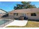 Large backyard with pool, hot tub, and patio at 164 Morning Glory Dr, Lake Mary, FL 32746