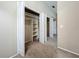 A bright room features a spacious closet with multiple doors and adjustable shelving at 164 Morning Glory Dr, Lake Mary, FL 32746