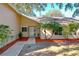 Charming entryway showcasing a decorative front door, natural light, and manicured landscaping at 164 Morning Glory Dr, Lake Mary, FL 32746