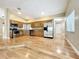 Open kitchen boasts stainless steel appliances and a bright eat-in area at 164 Morning Glory Dr, Lake Mary, FL 32746