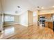 Open layout shows living area connects to updated kitchen with stainless appliances at 164 Morning Glory Dr, Lake Mary, FL 32746