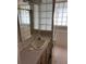 Bathroom with a sink, vanity, and tiled shower at 167 Benjamin Dr, Ormond Beach, FL 32176