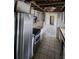 Kitchen with stainless steel appliances needing updating at 167 Benjamin Dr, Ormond Beach, FL 32176