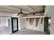 Living room with water damage and exposed ceiling beams at 167 Benjamin Dr, Ormond Beach, FL 32176