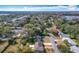 Aerial view of house and surrounding area, nestled amongst trees at 1930 Albert Lee Pkwy, Winter Park, FL 32789