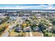 Aerial view showing home, landscape, and city skyline in background at 1930 Albert Lee Pkwy, Winter Park, FL 32789