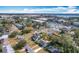 Aerial view showcasing home and surrounding neighborhood, near a lake at 1930 Albert Lee Pkwy, Winter Park, FL 32789