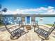 Backyard patio with fire pit and seating area at 1930 Albert Lee Pkwy, Winter Park, FL 32789
