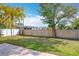 Backyard with grassy lawn and wooden fence at 1930 Albert Lee Pkwy, Winter Park, FL 32789