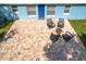 Relaxing backyard patio with fire pit and seating area, great for outdoor enjoyment at 1930 Albert Lee Pkwy, Winter Park, FL 32789
