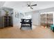 Bright dining area with a round table, four chairs, and wood-look flooring at 1930 Albert Lee Pkwy, Winter Park, FL 32789