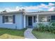 Light blue house with a screen door and walkway at 1930 Albert Lee Pkwy, Winter Park, FL 32789