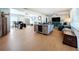 Open concept living and dining area with hardwood floors at 1930 Albert Lee Pkwy, Winter Park, FL 32789