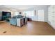 Open concept living and dining area with hardwood floors at 1930 Albert Lee Pkwy, Winter Park, FL 32789