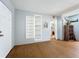 Living room with hardwood floors and built-in shelving at 1930 Albert Lee Pkwy, Winter Park, FL 32789