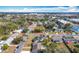 Aerial view showcasing a charming residential neighborhood with tree-lined streets at 1930 Albert Lee Pkwy, Winter Park, FL 32789