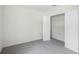 Bedroom with double door closet and grey carpet at 2623 Sage Valley Way, Winter Haven, FL 33884