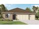 Attractive one-story home with three-car garage and landscaped yard at 2623 Sage Valley Way, Winter Haven, FL 33884