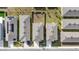 An overhead view of houses with gray roofs and green lawns at 2630 Angel Falls Dr, Davenport, FL 33837