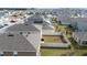 Aerial view showcasing a home's backyard and privacy fence at 2630 Angel Falls Dr, Davenport, FL 33837