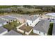 Aerial view of houses with fenced backyards and grassy areas at 2630 Angel Falls Dr, Davenport, FL 33837
