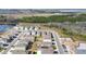 Aerial view of a residential area with houses and green spaces at 2630 Angel Falls Dr, Davenport, FL 33837