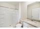 Clean bathroom featuring shower, toilet and vanity with granite countertop at 2630 Angel Falls Dr, Davenport, FL 33837