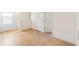 Upstairs bonus room with wood-style floors and a nearby closet at 2630 Angel Falls Dr, Davenport, FL 33837